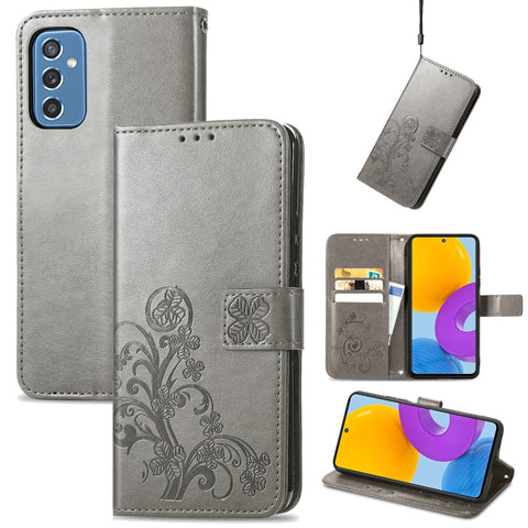 Four-leaf Clasp Embossed Leather Phone Case with Lanyard & Card Slot & Wallet & Bracket Function, For Samsung Galaxy S22 5G, For Samsung Galaxy S22+ 5G, For Samsung Galaxy S22 Ultra 5G, For Samsung Galaxy M52  5G, For Samsung Galaxy A13 5G